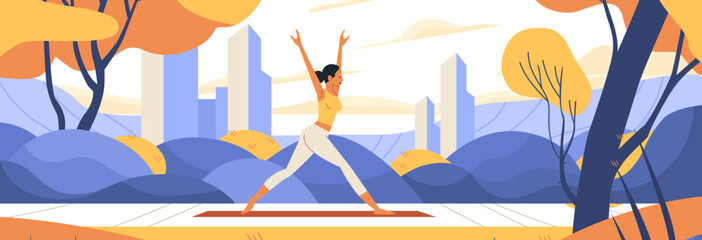 Woman practicing yoga outdoors in autumn park with trees and cityscape background fitness wellness healthy lifestyle nature landscape
