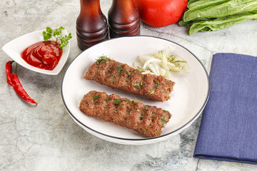 Kebab with beef served onion