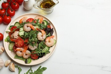 Delicious shrimp salad and ingredients on white marble table, flat lay. Space for text