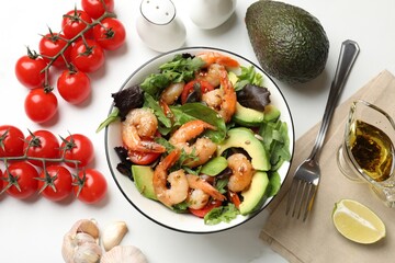Delicious shrimp salad and ingredients on white table, flat lay