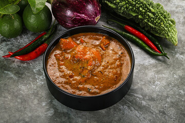 Indian cuisine - chicken curry with spices