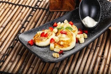 Russian cuisine curd pancake Syrniki