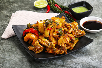 Vietnamese cuisine - fried frog with vegetables