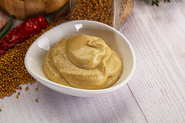 Dijon mustard sauce in the bowl