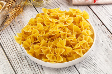 Raw dry Italian pasta - farfalle
