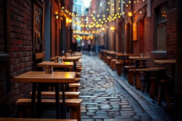 Obraz premium Cozy alley restaurant with outdoor seating twinkling lights at dusk