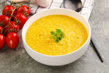 Vegetarian corn cream soup served parsley
