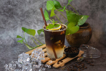 Coffee, mint and lemon flavored and blended into a drink.