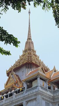Beautiful architecture of Wat Traimit, Golden Buddha temple in Bangkok, Thailand. Vertical video.