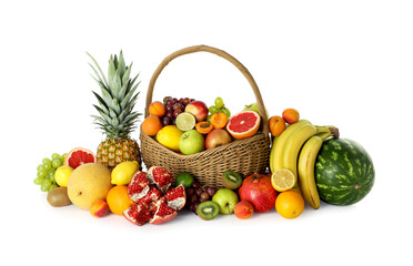 Many different fresh fruits in wicker basket isolated on white