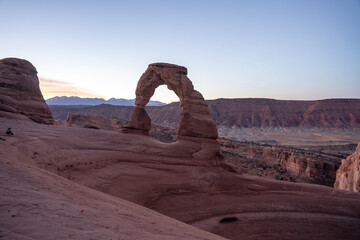 A stunning view of Delicate Arch during sunrise on a cool October morning.