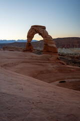 A stunning view of Delicate Arch during sunrise on a cool October morning.