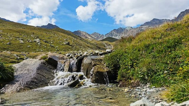Gran Paradiso Park, River and Alps Mountain in Italy, Real Time
