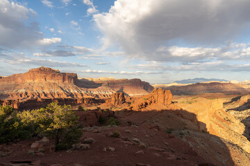 A breathtaking sunrise view of red rocks at Capitol Reef National Park, Utah.