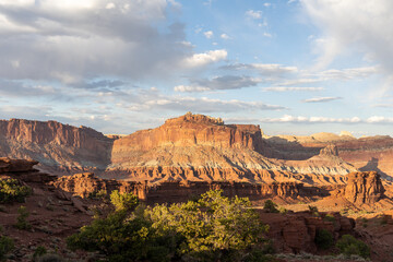 A breathtaking sunrise view of red rocks at Capitol Reef National Park, Utah.