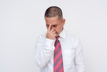 A middle aged office male professional sighs in annoyance from other people's incompetence and fumbles. Set against a white background.