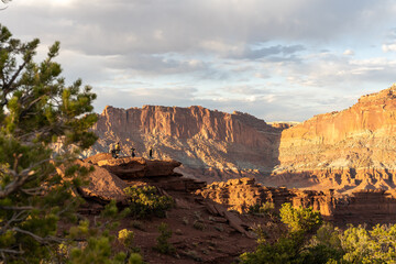 A breathtaking sunrise view of red rocks at Capitol Reef National Park, Utah.