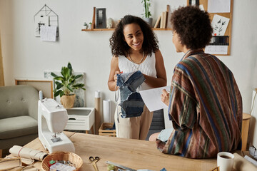 Couple joyfully transforms old clothing into new fashion pieces.