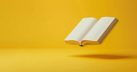 Floating open book against a bright yellow background. Ideal for educational content, literature themes, and creative advertising concepts.