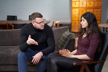 Sad woman on consultation with psychologist, visiting therapist concept