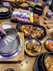 Korean foods served on a dining table. Perfect for photo illustration, article, or any cooking contents.
