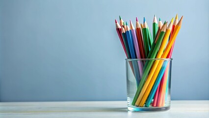 Fototapeta premium Pencils neatly arranged in a glass holder, pencils, glass, holder, organization, stationary, office, supplies, neat