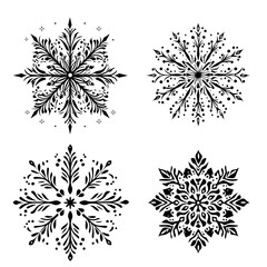 Obraz premium Elegant Black and White Snowflake Designs Winter Holiday Vector Illustrations