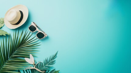 Fototapeta premium Top view of a travel flat lay featuring an airplane, tropical palm leaf and summer accessories on a blue background, with white highlights accentuating the scene and space left for text