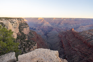 A stunning sunrise view of the red rocks at Grand Canyon National Park, Arizona.