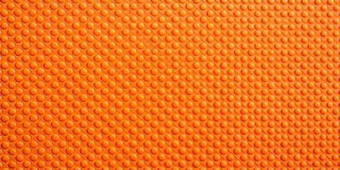 Obraz premium Orange rubber silicone surface texture, perfect for background or design element , rubber, orange, silicon, surface