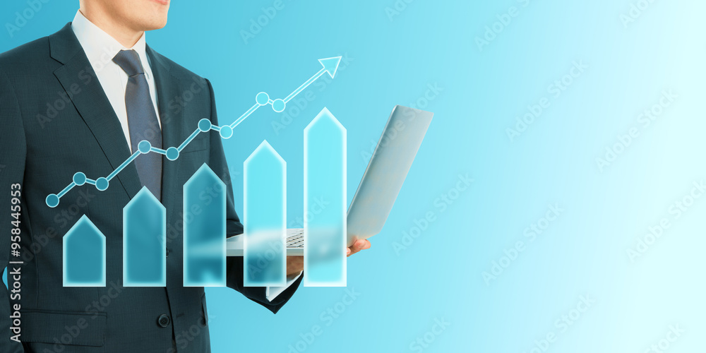 Poster close up of businessman hands using laptop with abstract creative growing business chart on blue bac
