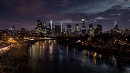 Fototapeta premium Present the Philadelphia skyline at twilight, with the city lights beginning to twinkle against the darkening sky