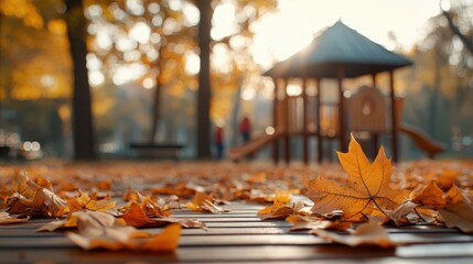 A serene playground surrounded by vibrant autumn leaves and warm sunlight, capturing the essence of fall in a peaceful setting.