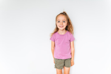 Cute girl 4-5 year old posing in studio