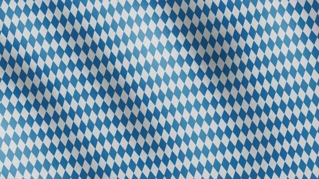 Bavaria flag of the oktoberfest flutters in the wind. Wavy flag clothes textured.