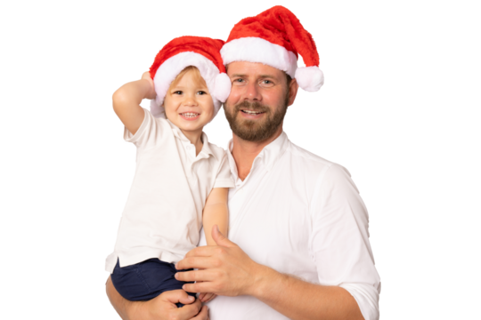 Portrait of a happy father and baby boy in santa hat isolated over transparent background.