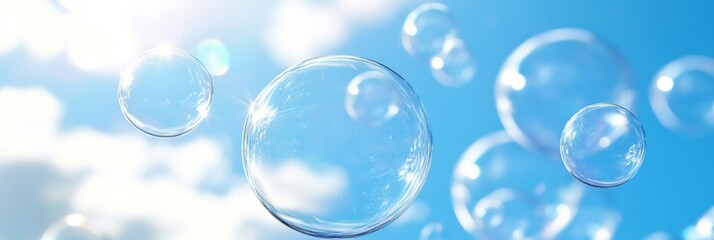 Soap Bubbles Floating Gracefully Against a Bright Blue Sky with Fluffy Clouds