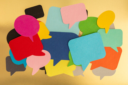 Colorful Speech Bubbles on Golden Background