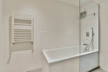 Modern minimalist bathroom interior with white fixtures