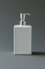 Obraz premium White Ceramic Soap Dispenser with Silver Pump