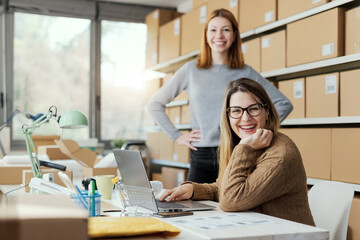 E-commerce business owners working together in the store