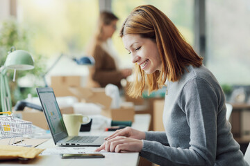 E-commerce employee working in the office