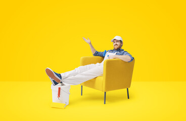 House painter sitting and showing the finished work © StockPhotoPro