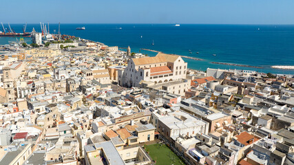 Aerial view of the Pontifical Basilica of Saint Nicholas in the old town of Bari, Puglia, Italy. It is a Catholic Church in the historic center of the city built in the Apulian Romanesque style.