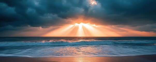 Sun rays breaking through dark storm clouds over the ocean, dramatic weather, hope after the storm