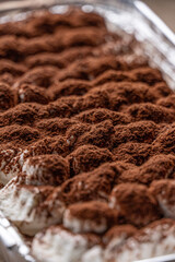 chocolate powder on whipping cream
