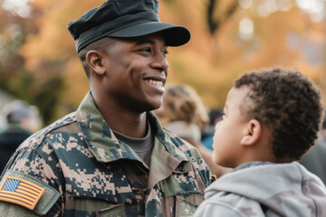 Fototapeta premium African-American soldier in uniform smiling at a child during a Veterans Day event symbolizing family and gratitude