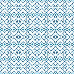 Fototapeta premium Seamless blue and white pixel art pattern arranged in a repeating geometric pattern. This vector illustration is perfect for use in winter themed projects, textiles, digital artwork, and home decor