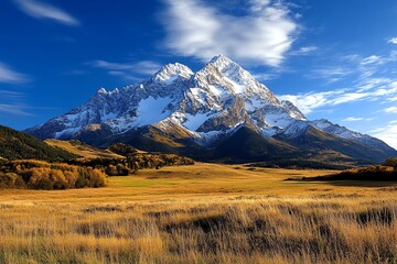Snow-dusted peaks, early morning light, quiet solitude define the peaceful start of a mountain day