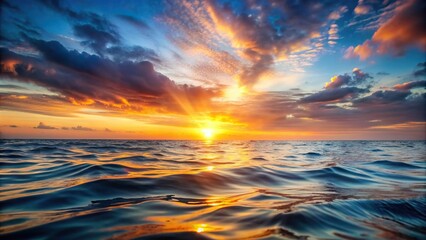 Obraz premium water, depth of field, background, peaceful, calm, relaxing, ocean, tranquil, evening,abstract, dreamy, Abstract background sunset over the ocean with a mesmerizing depth of field